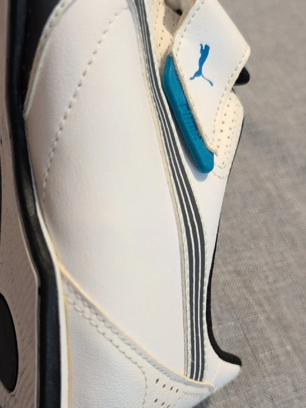 Puma Men’s White, Black and Blue Athletic Sneakers